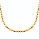 Collier chaîne de billes ras du cou en acier doré