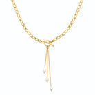 Collier chaîne forçat en Y et pampilles de perles en acier doré
