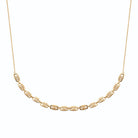 Collier chaîne à perles tonneaux côtelées en plaqué or