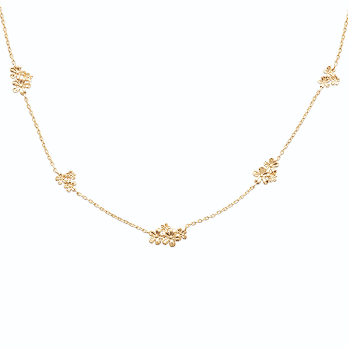 Collier chaîne à quatre grappes de fleurettes en plaqué or