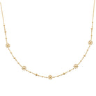 Collier chaîne fine à perles de métal et rosaces granulées en plaqué or