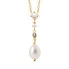 Collier chute de zircons et perle de culture baroque en plaqué or