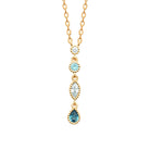 Collier chute de zircons et pierres bleues sertis clos en plaqué or