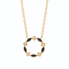 Collier couronne ajourée laque noire et zircons en plaqué or