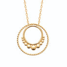Collier double cercle torsadé et frise perlée en plaqué or