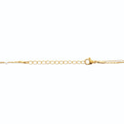 Collier double rang ponctué de perles d’imitation en acier doré