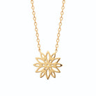 Collier fleur ajourée façon marguerite en plaqué or
