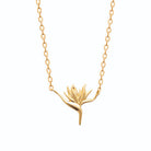 Collier fleur d’oiseau de paradis stylisée en plaqué or