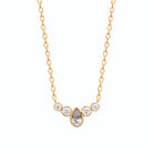 Collier frise incurvée de zircons et goutte centrale en plaqué or