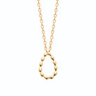 Collier goutte ajourée en grains de métal façon grain de riz en plaqué or