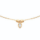 Collier goutte zircon navette et perles ciselées en plaqué or
