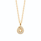 Collier goutte pavée de zircons et nœud lisse en plaqué or