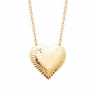 Collier grand cœur bombé et godrons rayonnants en plaqué or