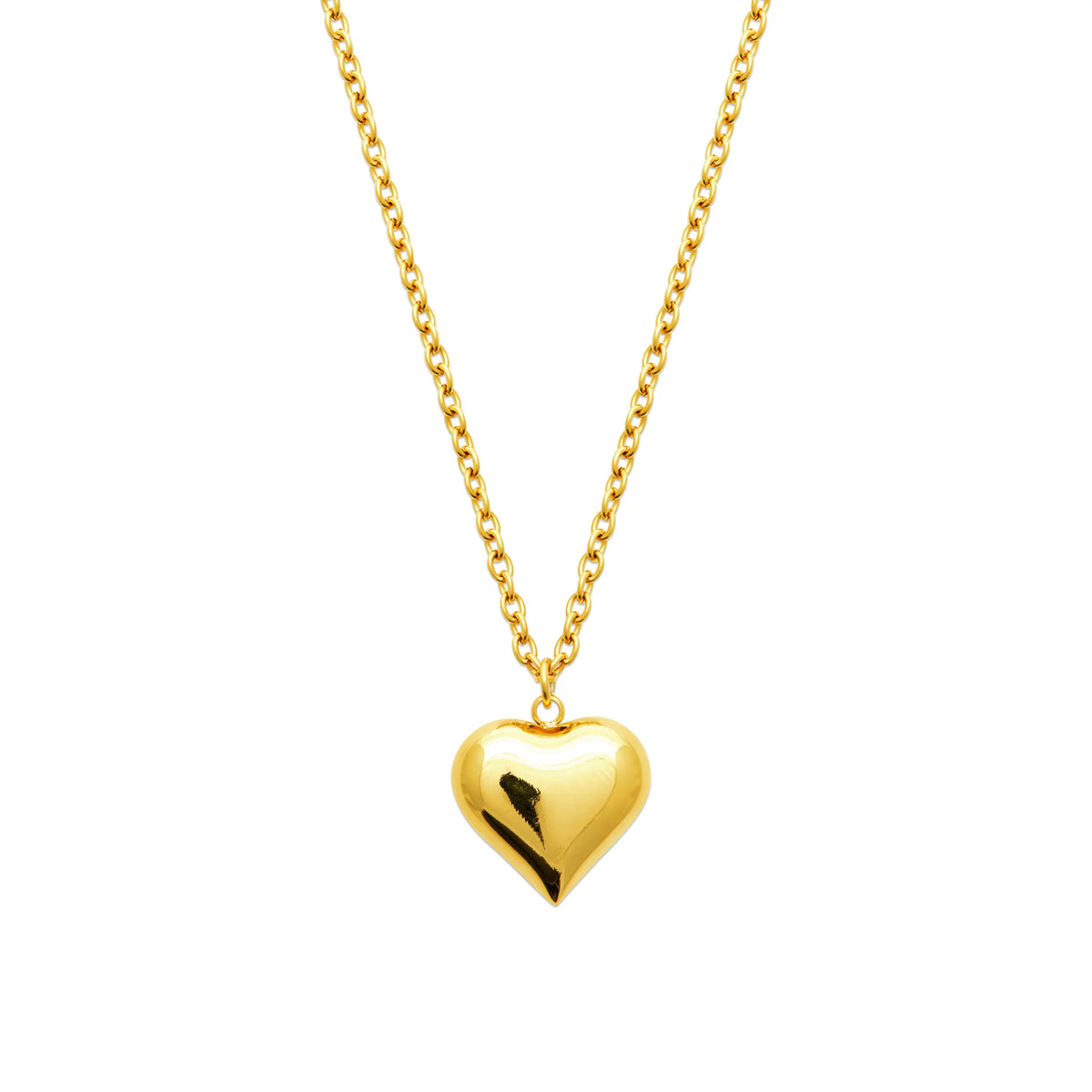 Vue d’ensemble du collier long cœur doré et de sa chaîne fine