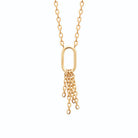 Collier maillon ovale et pompon de chaînettes en plaqué or