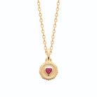 Collier médaille perlée et pierre fuchsia taille cœur en plaqué or