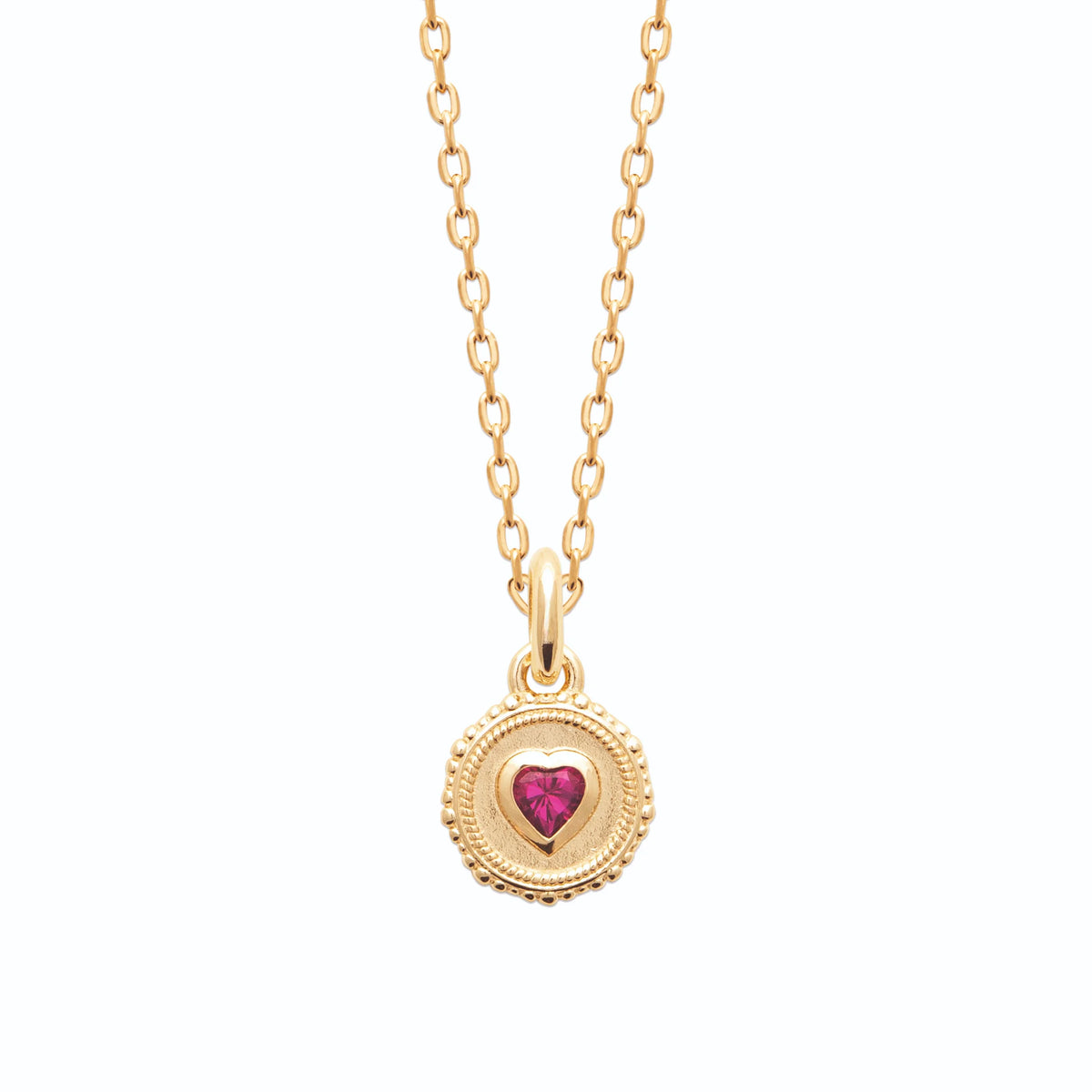 Collier médaille perlée et pierre fuchsia taille cœur en plaqué or