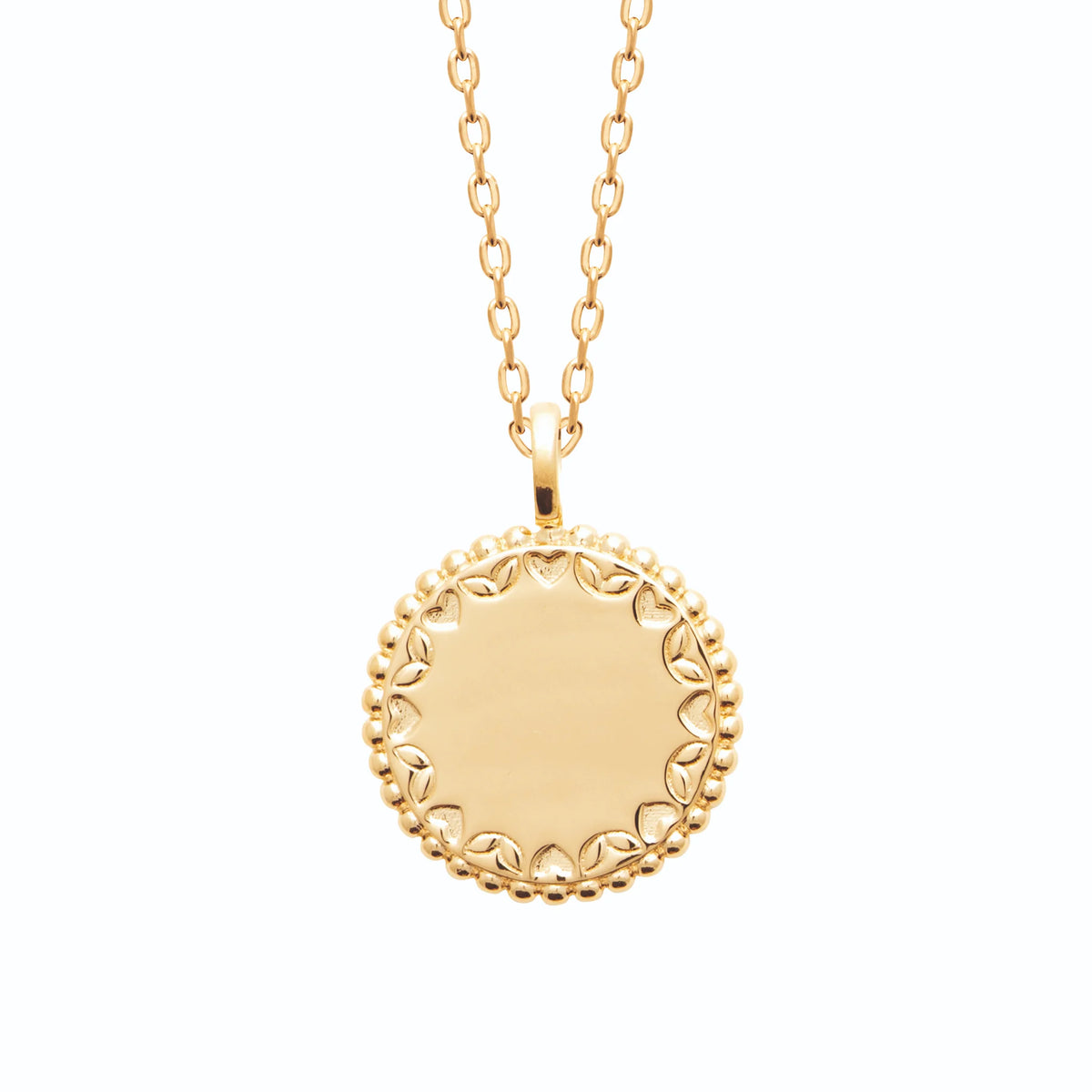 Collier médaillon cœurs et feuillages bordé de perles en plaqué or