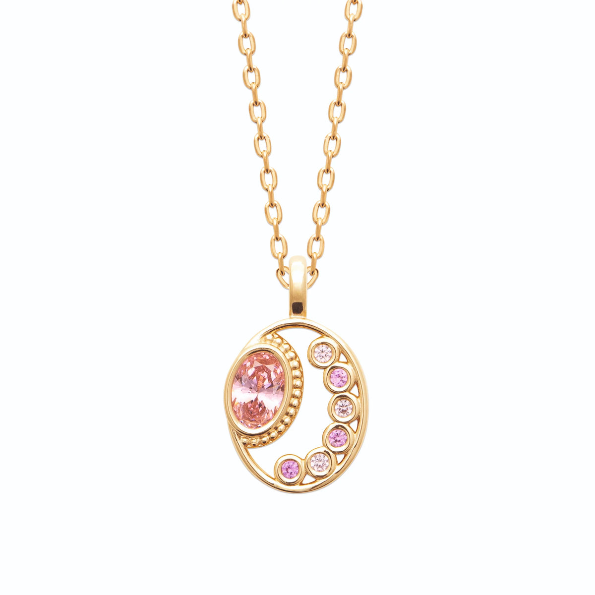 Collier médaillon ovale et croissant de lune pierres roses en plaqué or