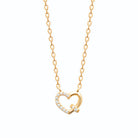 Collier pendentif cœur ouvert noué zircons en plaqué or