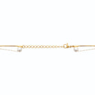 Collier double rang perles espacées et chaîne serpent en acier doré