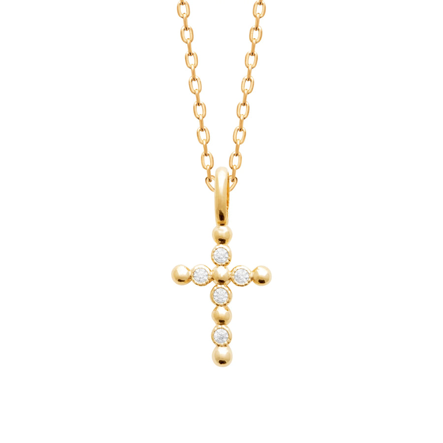 Collier petite croix de perles de métal et zircons en plaqué or, porté