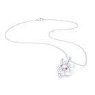Collier tête de tigre or blanc 18 carats, yeux de rubis, posé à plat avec chaîne et fermoir