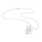 Collier tête de tigre or blanc 18 carats, yeux de saphirs orange, posé à plat avec chaîne et fermoir