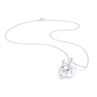 Collier tête de tigre or blanc 18 carats, yeux de saphirs rouges, posé à plat avec chaîne et fermoir