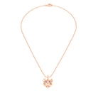 Collier tête de tigre en or rose aux yeux de saphirs bleus, vu de face sur une chaîne forçat de 40 cm