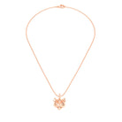 Collier tête de tigre en or rose aux yeux de saphirs orange, vu de face sur une chaîne forçat de 40 cm
