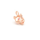 Pendentif tête de tigre en or rose 18 carats, yeux sertis de saphirs roses, en gros plan, atelier Bajoia de Sèvres