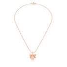 Collier tête de tigre en or rose aux yeux de saphirs rouges, vu de face sur une chaîne forçat de 40 cm