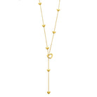 Collier en Y en acier doré, chaîne semée de petits cœurs et cœur filaire à la jonction