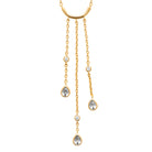 Collier en Y à trois chaînettes et zircons poire en plaqué or