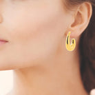 Boucles d’oreilles créoles goutte en acier PVD doré