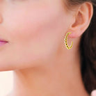 Boucles d’oreilles créoles perlées en acier PVD doré