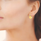 Boucles d’oreilles demi-créoles dôme en acier PVD doré