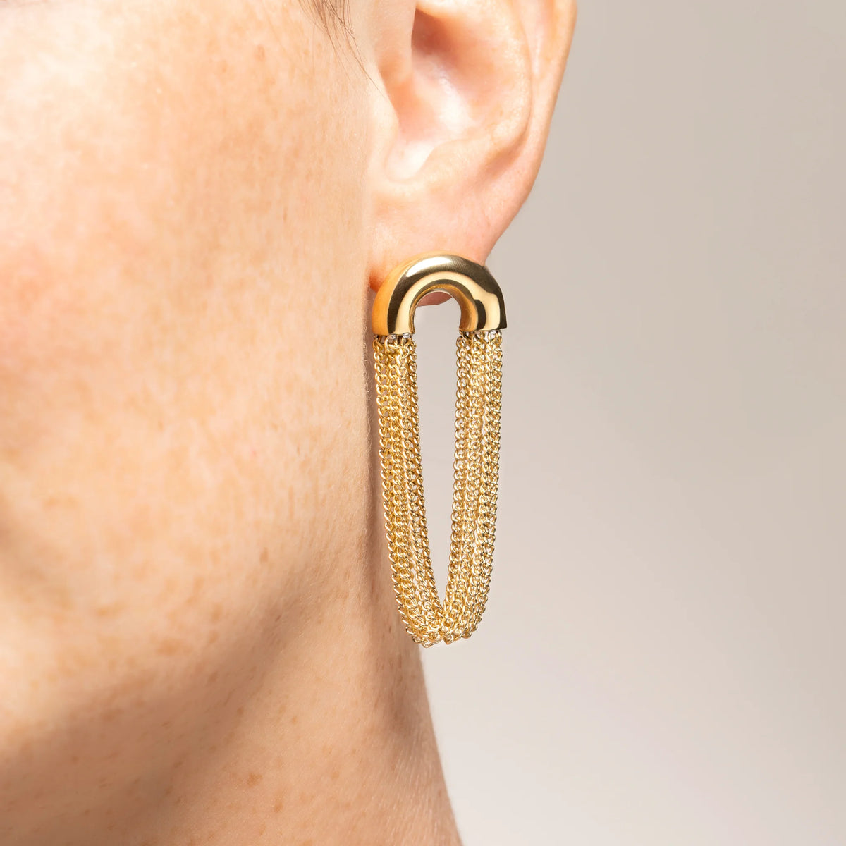 Boucles d’oreilles pendantes arche et chaînes en acier PVD doré