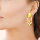 Boucles d’oreilles pendantes ovales emboîtés en acier PVD doré