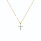 Pendentif croix sertie de zircons navette en plaqué or vu de profil