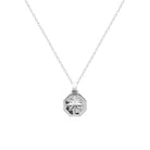 Pendentif médaille octogonale rose des vents en argent rhodié vu de profil