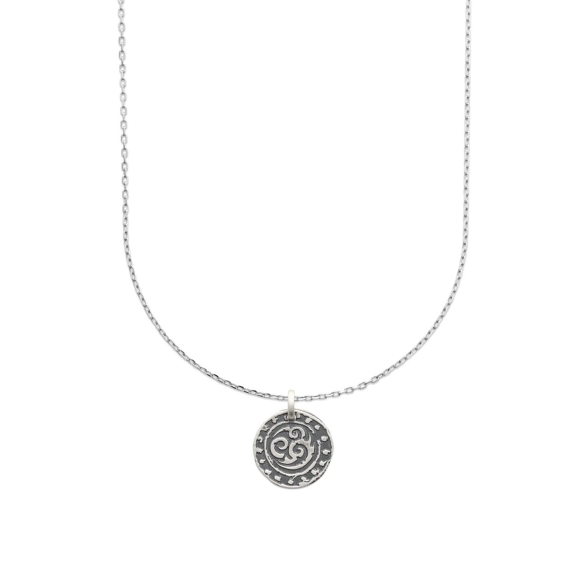 Pendentif médaille ronde à spirales en argent 925 vu de profil