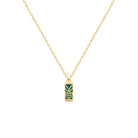 Pendentif tiki ajouré sur agate verte en plaqué or vu de profil