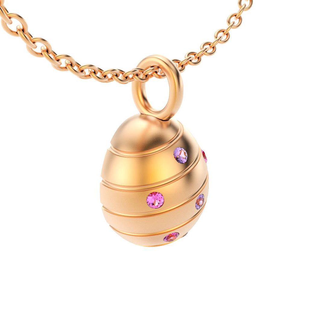 pendentif oeuf pour femme en or rose avec saphirs violet et saphirs roses